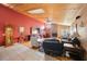 Cozy living room with wood ceilings, a brick fireplace, and comfortable seating at 512 Crystal Grove Blvd, Lutz, FL 33548