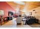 Spacious living room with wooden ceilings, a fireplace and ample natural light at 512 Crystal Grove Blvd, Lutz, FL 33548