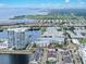 Wide aerial view showcases the community's waterfront location and surrounding cityscape at 5351 Bridge St # 16, Tampa, FL 33611