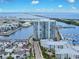 Waterfront community with a large condo in the background and a view of the water at 5351 Bridge St # 16, Tampa, FL 33611