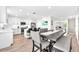 Bright, modern kitchen with stainless steel appliances and a stylish island for casual dining at 5351 Bridge St # 16, Tampa, FL 33611