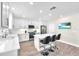 Bright kitchen with stainless steel appliances and a modern island for casual dining at 5351 Bridge St # 16, Tampa, FL 33611