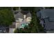 Stunning aerial view of a luxury home with a private pool surrounded by lush landscaping at 555 21St Ne Ave, St Petersburg, FL 33704