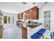 Bright kitchen features stainless appliances, granite countertops, and wood cabinets at 555 21St Ne Ave, St Petersburg, FL 33704