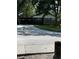 Charming single-story home with stone accents, large windows, and a convenient covered carport at 5608 N River Shore Dr, Tampa, FL 33603