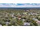Wide aerial shot of a wooded neighborhood highlighting the location of the featured home at 5804 Terncrest Dr, Lithia, FL 33547