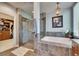 Well-appointed bathroom featuring a walk-in shower and separate soaking tub at 5804 Terncrest Dr, Lithia, FL 33547