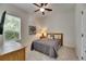 Cozy bedroom filled with natural light and a comfortable bed with gray bedding at 5804 Terncrest Dr, Lithia, FL 33547