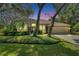 Charming single-story home with a well-manicured lawn and mature trees creating a serene setting at 5804 Terncrest Dr, Lithia, FL 33547