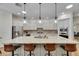 Modern kitchen featuring a large island with bar seating and stainless steel appliances at 5804 Terncrest Dr, Lithia, FL 33547