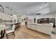 Open floor plan showcases living room and kitchen with a bright, airy feel at 5804 Terncrest Dr, Lithia, FL 33547