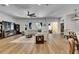 Bright living room with modern ceiling fan and patio access, perfect for indoor-outdoor living at 5804 Terncrest Dr, Lithia, FL 33547