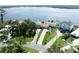 Breathtaking aerial view highlighting waterfront properties with boat docks and manicured lawns at 6663 Bayou Grande Ne Blvd, St Petersburg, FL 33702