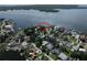Aerial view of waterfront homes shows lush trees and private boat docks at 6663 Bayou Grande Ne Blvd, St Petersburg, FL 33702