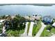 Stunning aerial view of waterfront homes featuring lush landscaping and beautiful water views at 6663 Bayou Grande Ne Blvd, St Petersburg, FL 33702