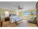 Bright bedroom features a nice view from the window and comfortable furniture at 6663 Bayou Grande Ne Blvd, St Petersburg, FL 33702