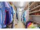 Spacious walk-in closet with custom shelves and racks for organized storage at 6663 Bayou Grande Ne Blvd, St Petersburg, FL 33702