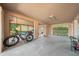Spacious garage featuring ample storage and unique mural with access to the exterior at 6663 Bayou Grande Ne Blvd, St Petersburg, FL 33702
