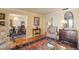 Bright living room featuring a comfortable sofa, armchairs, and a glass coffee table on top of an area rug at 6663 Bayou Grande Ne Blvd, St Petersburg, FL 33702