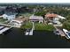 Waterfront home with a private dock, boat lift, and beautifully landscaped backyard at 6663 Bayou Grande Ne Blvd, St Petersburg, FL 33702