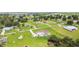 An aerial view displaying neighborhood homes and lush green spaces at 6707 Josie Dr, Seffner, FL 33584