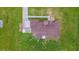 Aerial top-down view highlighting unique roof design and surrounding green spaces at 6707 Josie Dr, Seffner, FL 33584