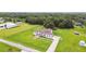 Aerial view of house, showing the sprawling lawn, neighborhood and natural beauty at 6707 Josie Dr, Seffner, FL 33584