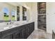 Bathroom featuring a double vanity with marble countertop, tile flooring, and glass enclosed shower at 6707 Josie Dr, Seffner, FL 33584