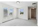 Bright bedroom with neutral carpet and balcony doors at 6707 Josie Dr, Seffner, FL 33584