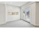 Bonus room featuring soft gray carpet and double doors leading to a outdoor patio at 6707 Josie Dr, Seffner, FL 33584