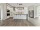 Kitchen with stainless steel appliances, white cabinetry, and tile flooring at 6707 Josie Dr, Seffner, FL 33584