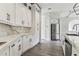 Bright kitchen features stainless steel appliances, and wood-look floors at 6707 Josie Dr, Seffner, FL 33584