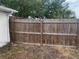 A traditional wooden fence at 7519 Kensico Dr, Port Richey, FL 34668