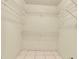 Walk-in closet with wire shelving and tiled floor at 8198 Terrace Garden Dr # 511, St Petersburg, FL 33709