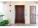 Building elevator with wooden door and call button at 8198 Terrace Garden Dr # 511, St Petersburg, FL 33709