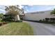 Exterior view of building with landscaping at 8198 Terrace Garden Dr # 511, St Petersburg, FL 33709