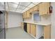 Kitchen with laminate countertops and oak cabinets, equipped with dishwasher at 8198 Terrace Garden Dr # 511, St Petersburg, FL 33709