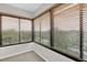 Sunroom featuring tile floors and views of the outdoors through multiple window panes at 8198 Terrace Garden Dr # 511, St Petersburg, FL 33709