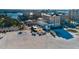 Beachfront restaurant and hotel with outdoor seating, offering stunning coastal views at 831 Mandalay Ave, Clearwater, FL 33767