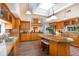 Bright kitchen with island, granite countertops, and stainless steel appliances at 831 Mandalay Ave, Clearwater, FL 33767
