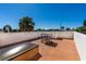 Rooftop deck featuring a table and seating area, offering plenty of space for entertaining or relaxing at 831 Mandalay Ave, Clearwater, FL 33767