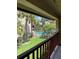 Balcony view with community pool and trees at 8636 Tahoe Ct # 13, Tampa, FL 33614