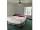 Cozy bedroom with ceiling fan and natural light from the window at 8636 Tahoe Ct # 13, Tampa, FL 33614