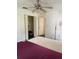 Bedroom with ceiling fan, window and closet space at 8636 Tahoe Ct # 13, Tampa, FL 33614