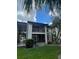 Charming two-story condo with a private balcony and screened-in patio overlooking the lush landscaping at 8636 Tahoe Ct # 13, Tampa, FL 33614