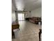 Spacious living room with sliding glass doors leading to a balcony at 8636 Tahoe Ct # 13, Tampa, FL 33614