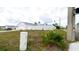 Exterior view of home with manicured lawn at 9429 Northcliffe Blvd, Spring Hill, FL 34606