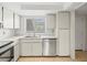 Close up of the bright kitchen featuring stainless steel appliances and generous counter space at 9804 Lombard Ct # 104, Tampa, FL 33618