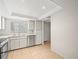 Well-lit kitchen equipped with stainless steel appliances and tile flooring at 9804 Lombard Ct # 104, Tampa, FL 33618