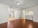 The living room with a peek into the well-maintained kitchen and pantry at 9804 Lombard Ct # 104, Tampa, FL 33618